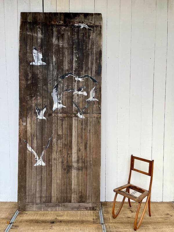 Seagulls old wooden boat warehouse door 